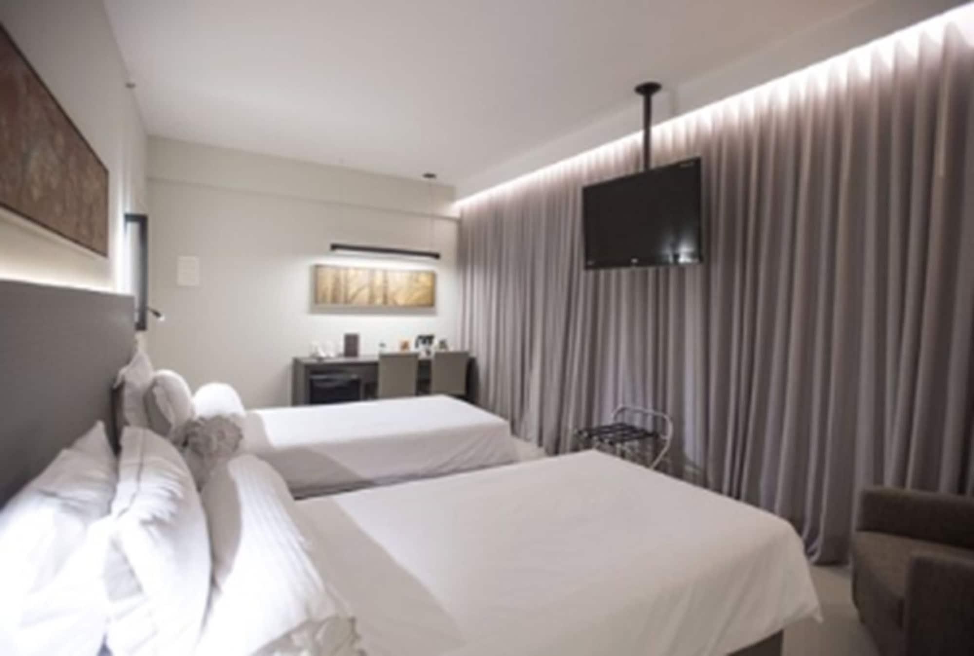 Royal Boutique Savassi Hotel Belo Horizonte Esterno foto A room at the hotel