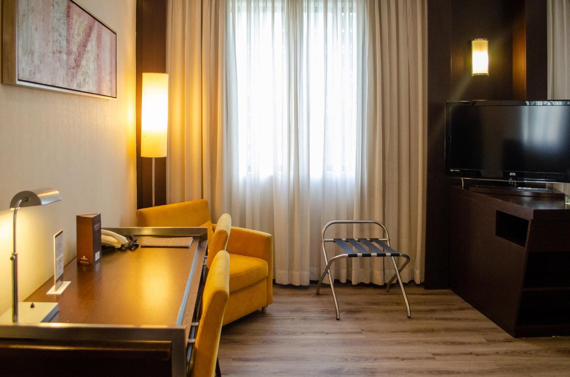 Royal Boutique Savassi Hotel Belo Horizonte Esterno foto A room at the hotel
