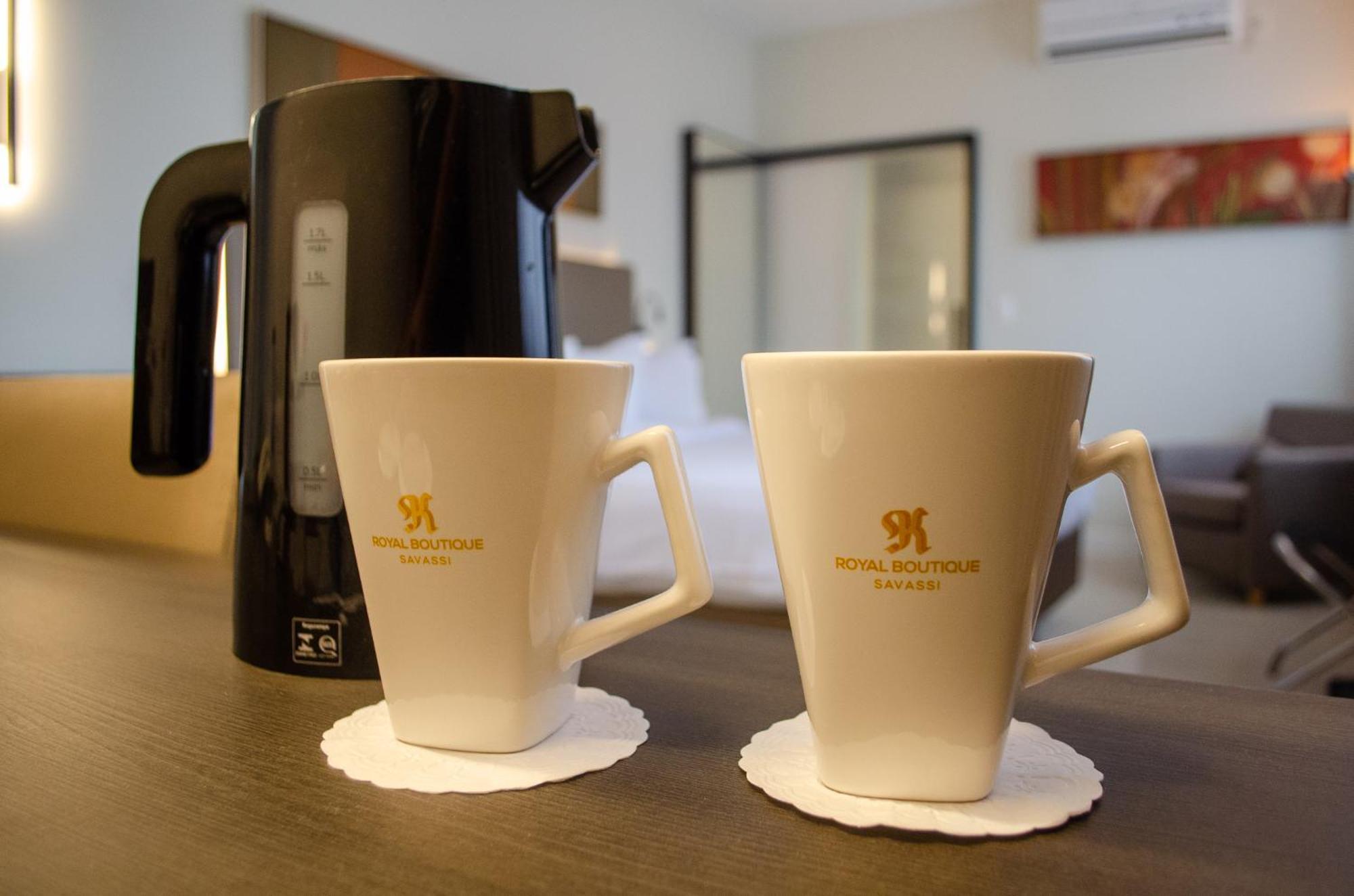 Royal Boutique Savassi Hotel Belo Horizonte Esterno foto A kettle and two cups