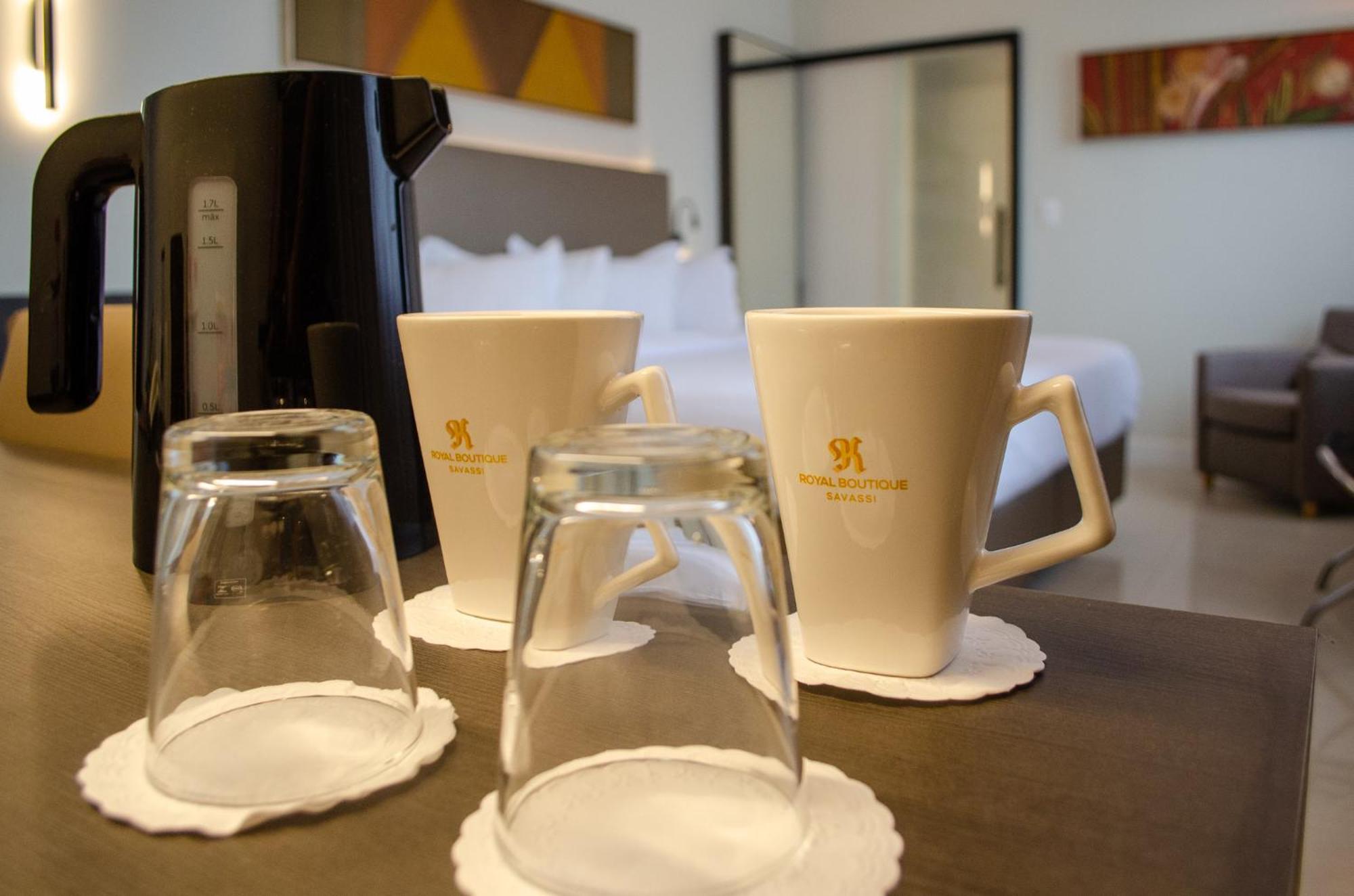 Royal Boutique Savassi Hotel Belo Horizonte Esterno foto A coffee pot and two cups