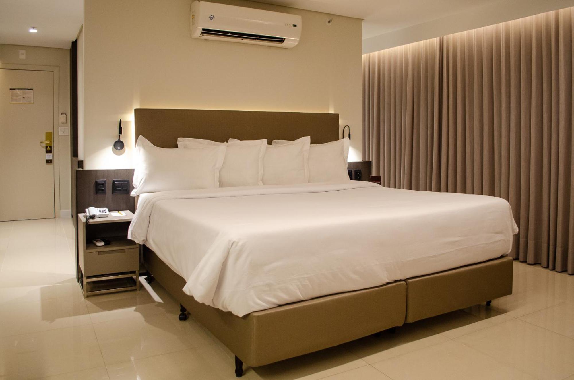 Royal Boutique Savassi Hotel Belo Horizonte Esterno foto A bedroom at the hotel