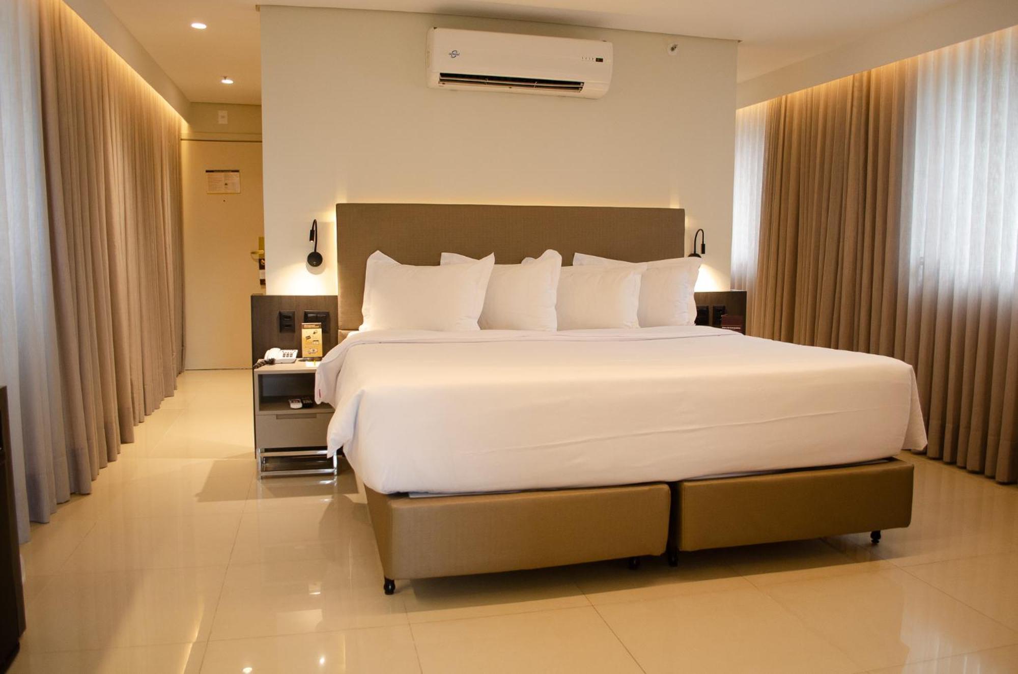 Royal Boutique Savassi Hotel Belo Horizonte Esterno foto A bedroom at the hotel